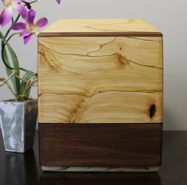 Right side view of a spalted elm and black walnut wooden cremation urn