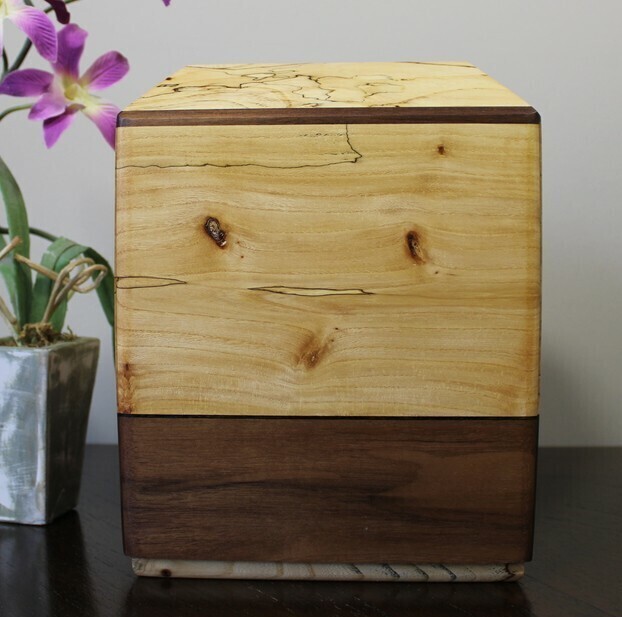 Back view of a spalted elm and black walnut wooden cremation urn