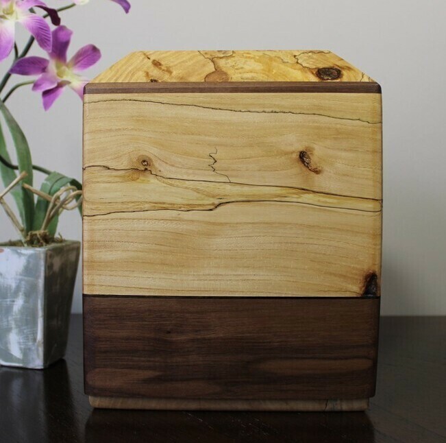 Left side view of a spalted elm and black walnut wooden cremation urn