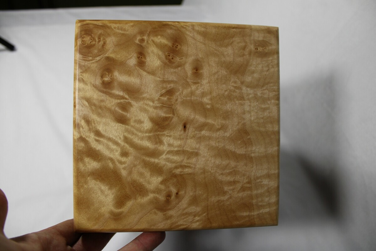 Top view of the quilted maple wooden cremation urn